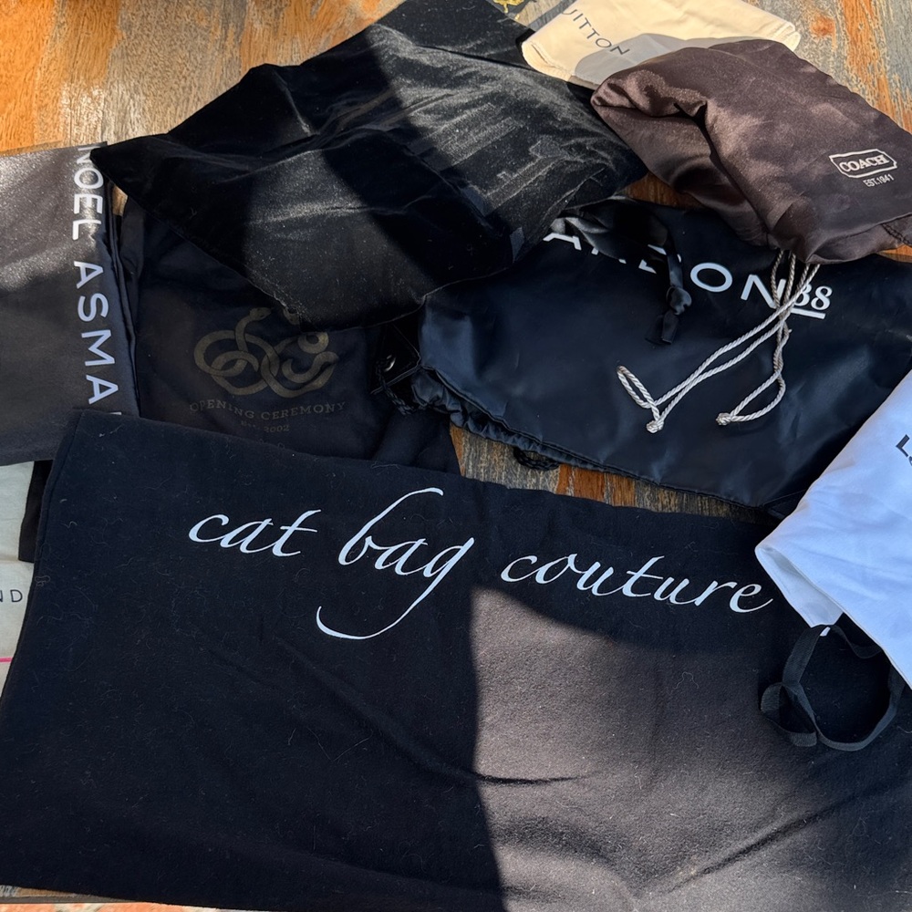 8 Assorted Dust Bags Collection